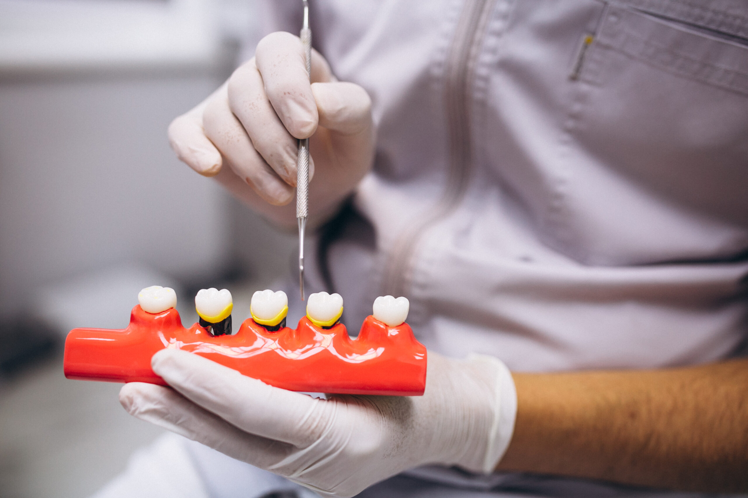 https://65broadwaydental.com/wp-content/uploads/2025/05/woman-patient-dentist-scaled-1.jpg